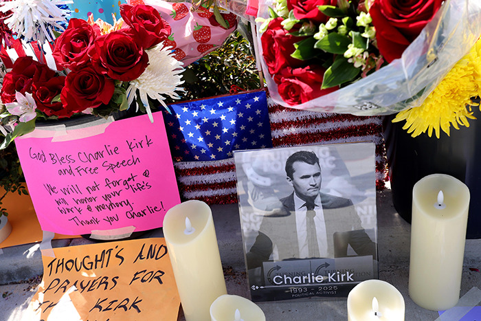 Memorial with flowers, candles, and a photo of Charlie Kirk, linked to people noticing eerie details about Tyler Robinson in court. Memorial with flowers, candles, and a photo of Charlie Kirk, linked to people noticing eerie details about Tyler Robinson in court.