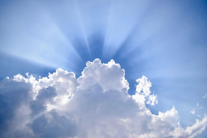 Clouds parting with sun rays shining through, symbolizing Christian rapture themes, money, and dollars in a spiritual sky scene. Clouds parting with sun rays shining through, symbolizing Christian rapture themes, money, and dollars in a spiritual sky scene.