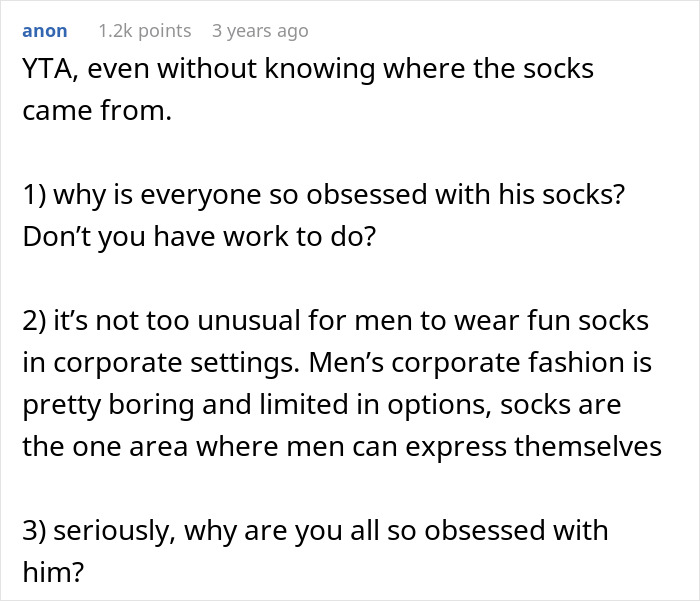 Comment discussing workplace harassment over colorful socks, debating expression and HR involvement in office dynamics. Comment discussing workplace harassment over colorful socks, debating expression and HR involvement in office dynamics.