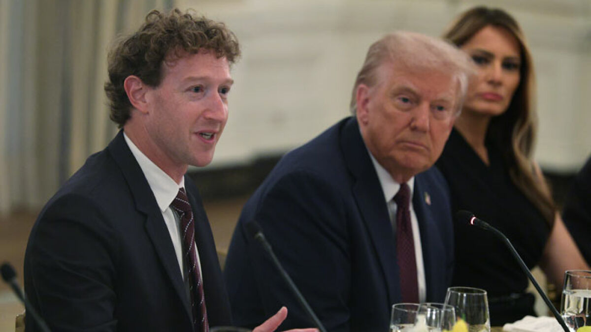 Mark Zuckerberg speaking at a formal meeting with Donald Trump and Melania Trump, capturing a hot mic moment.