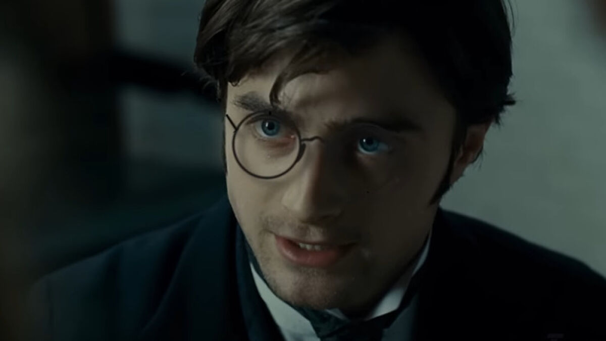 Close-up of Harry Potter character wearing round glasses in fan-made trailer for Harry Potter And The Cursed Child movie.