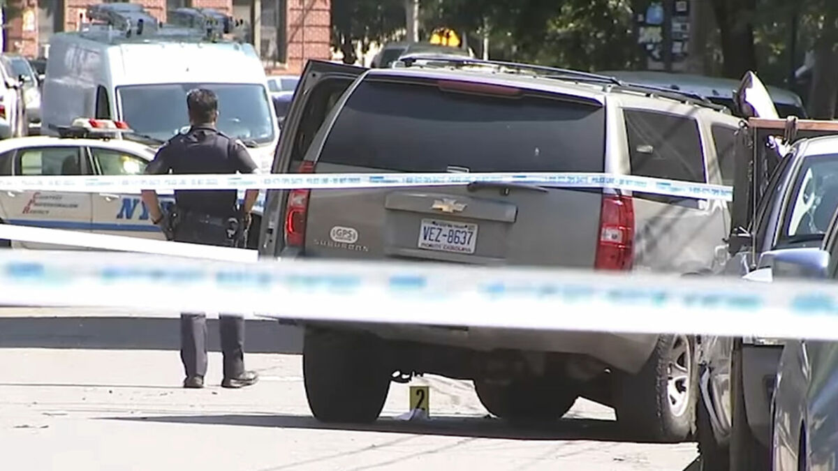 Police officer investigates scene with maniac driveru2019s vehicle after shocking response following teen hit on street.