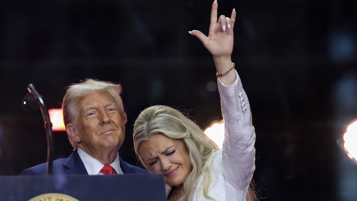 Erika Kirk making a gesture during husband's funeral as internet reacts following viral devil claim controversy.