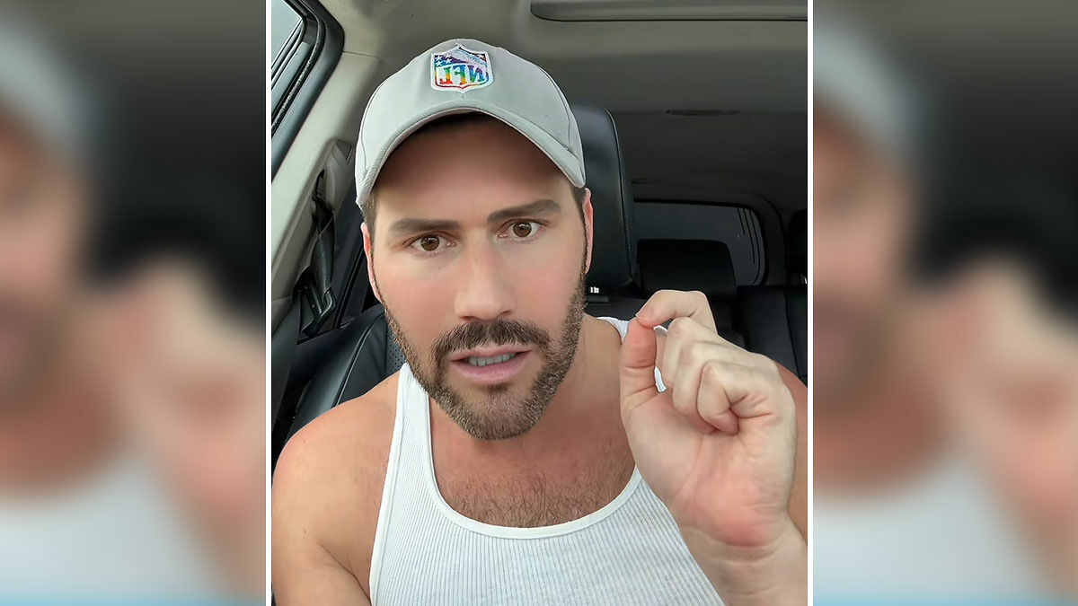 Man in a gray NFL cap and white tank top speaking inside a car, discussing RaptureTok and end of the world predictions.