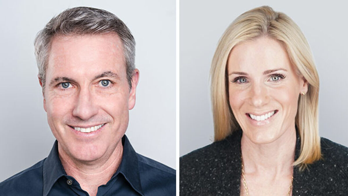 Man and woman smiling in a studio portrait highlighting Kristin Cabot Coldplay scandal insights and reactions.