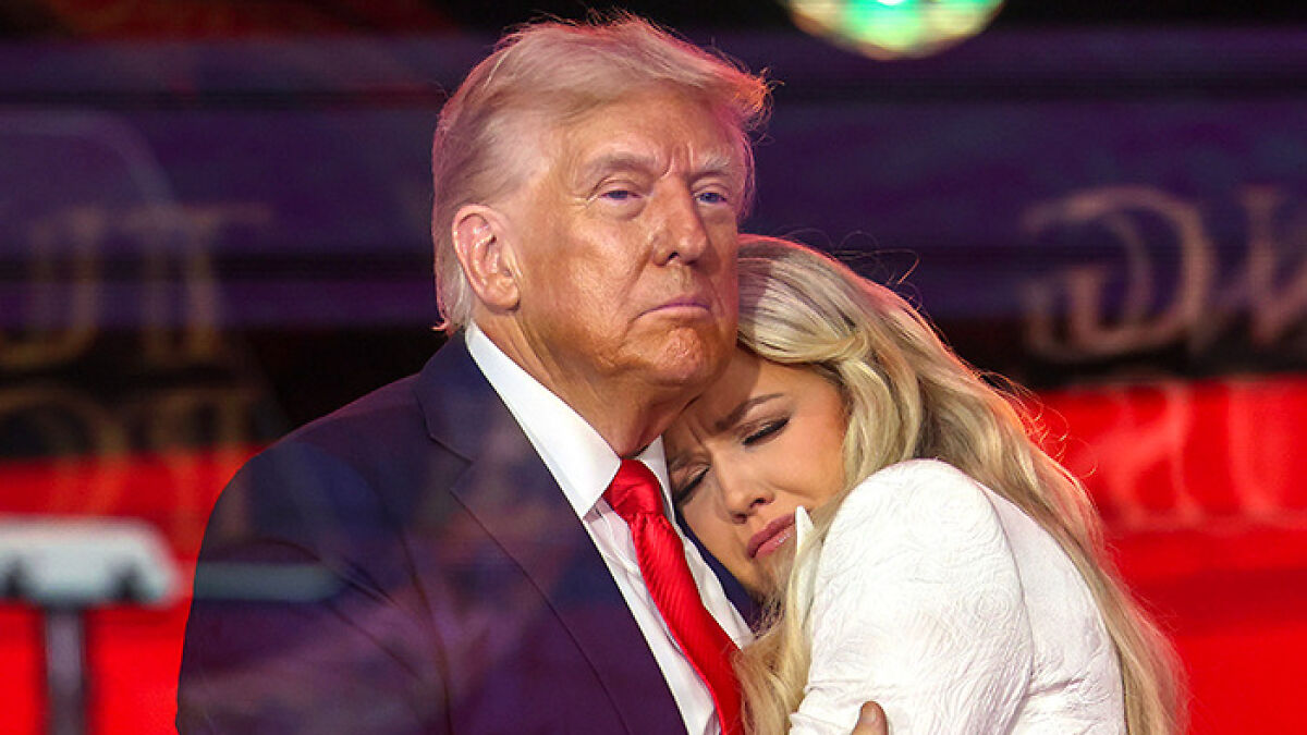 Donald Trump in a suit embracing a blonde woman with eyes closed, highlighting Erika Kirku2019s past connection.