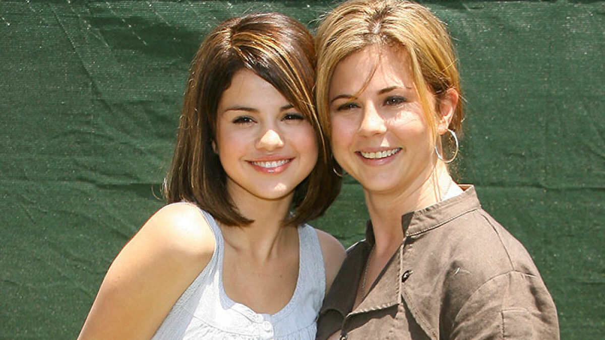 Selena Gomez with her mom smiling together outdoors, highlighting Selena Gomez's mom being snubbed at wedding.