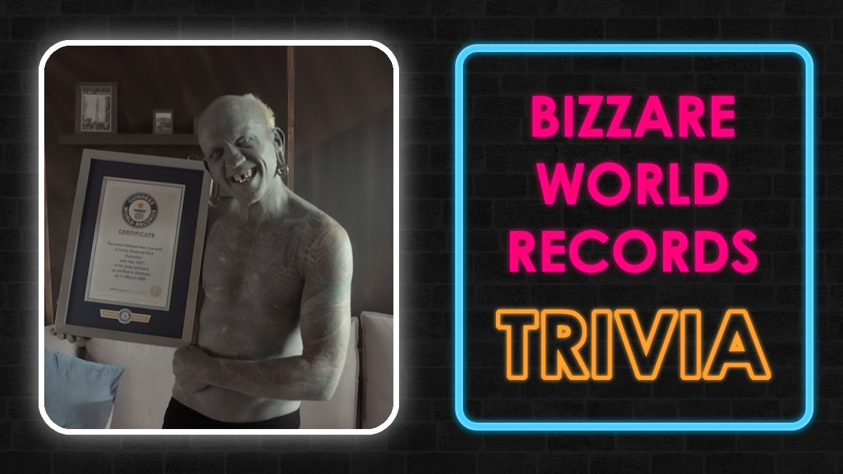Man with tattoos holding a framed world records certificate next to neon sign reading bizarre world records trivia quiz