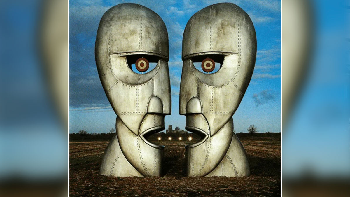 Two large metallic heads facing each other in a field, representing unexplained mysteries from the dawn of the internet.