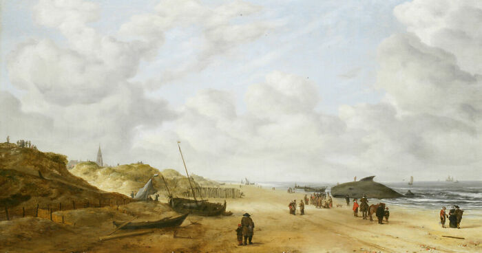 Restored historical painting of a coastal scene with boats, people, and a beached whale on a cloudy day.