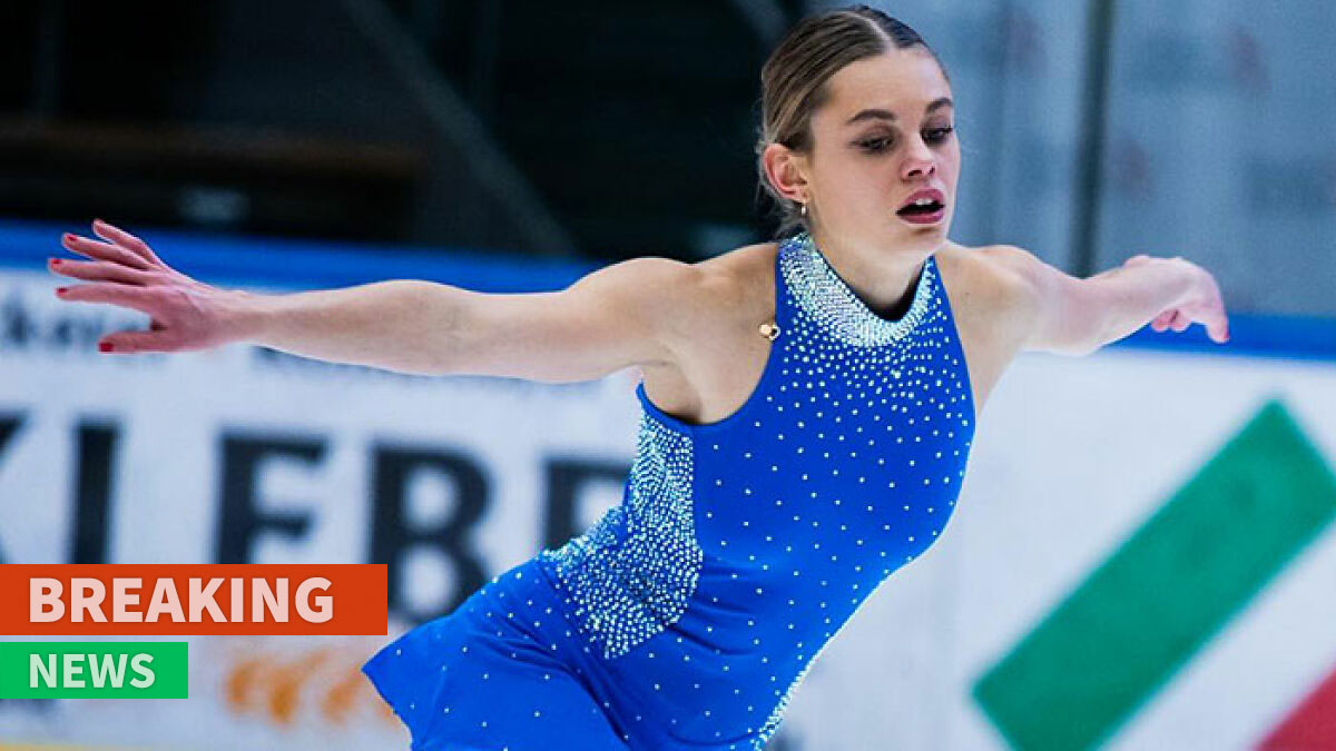 Champion figure skater Julia Marie Gaiser performing on ice wearing a blue outfit during a competition.