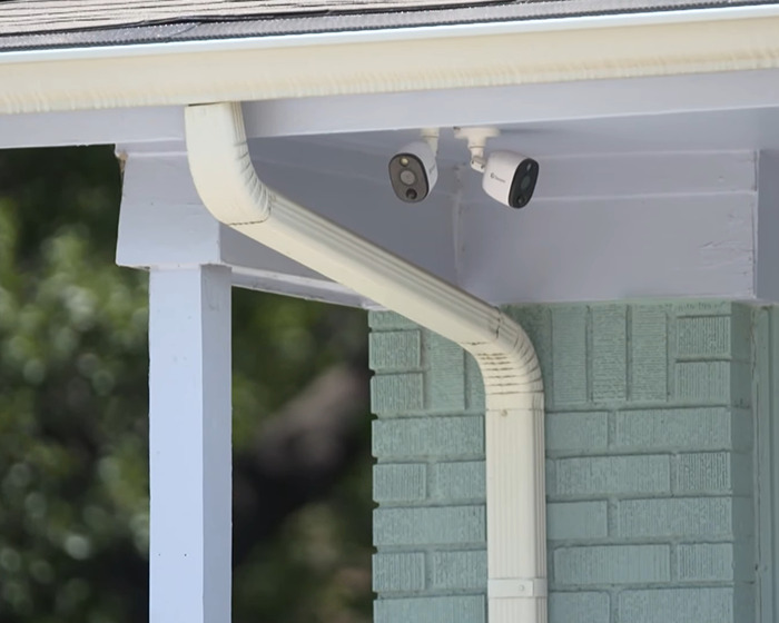Surveillance cameras mounted on a house corner, linked to shocking arrest in flight attendant disappearance case. Surveillance cameras mounted on a house corner, linked to shocking arrest in flight attendant disappearance case.