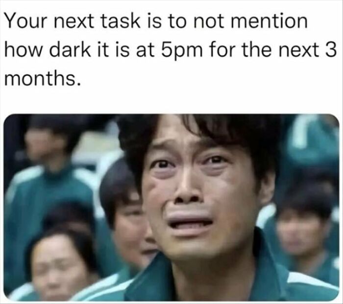 Man humor meme showing a distressed man with a caption about coping with early darkness at 5pm.