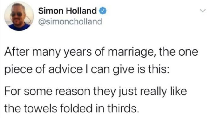 Tweet by Simon Holland sharing humorous men humor meme about marriage and towels folded in thirds as coping advice.