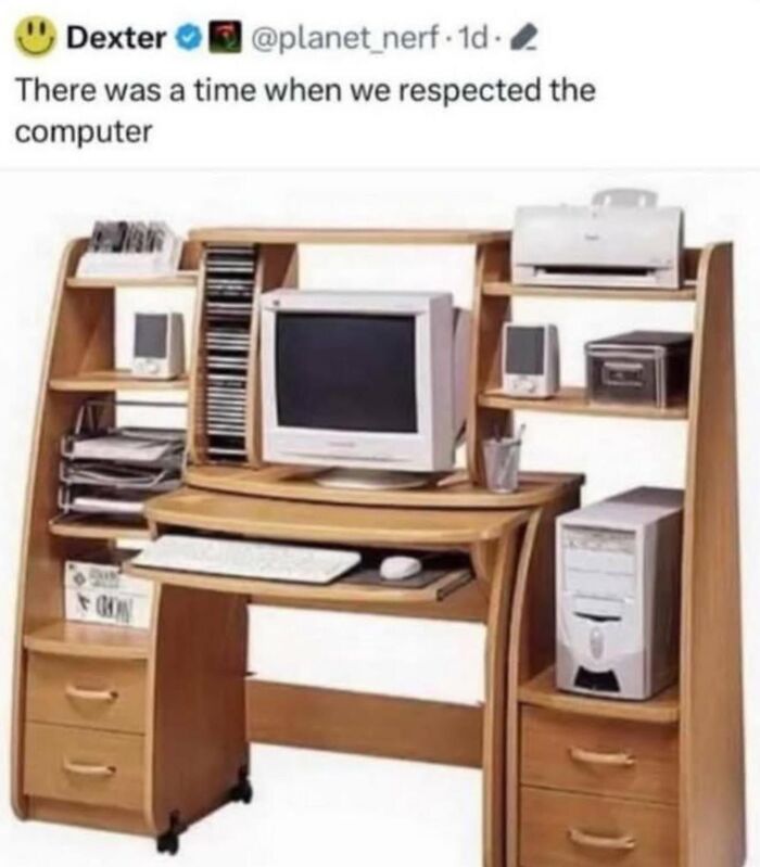 Old desktop computer setup on wooden desk illustrating nostalgia in men humor memes about coping mechanisms.