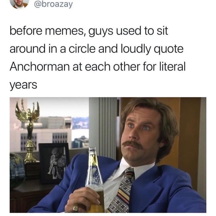 Man in blue suit holding beer, referencing men humor memes about coping by quoting Anchorman in groups.