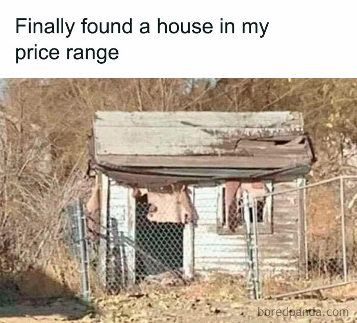 Dilapidated small house with broken windows and sagging roof humorously representing British jokes about high rent prices.