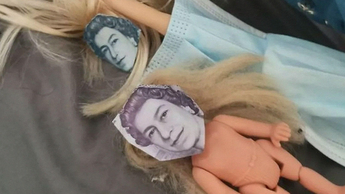 Two dolls with British currency faces and messy blonde hair lying by a blue mask in a humorous British jokes meme.