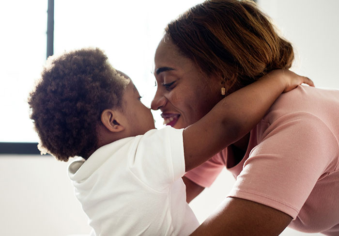 Mother and child sharing a loving moment, illustrating strength to fight another day with heartfelt connection. Mother and child sharing a loving moment, illustrating strength to fight another day with heartfelt connection.