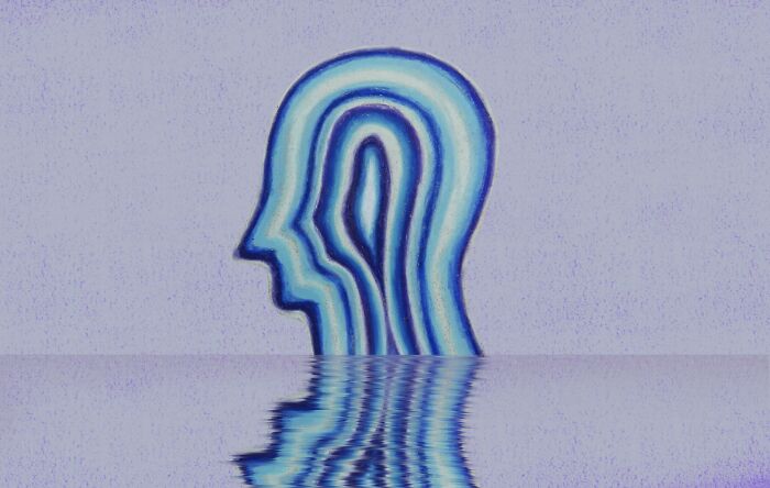 Abstract blue human profile illustration with layered profiles and a water reflection symbolizing trust your gut feeling and precognition. Abstract blue human profile illustration with layered profiles and a water reflection symbolizing trust your gut feeling and precognition.