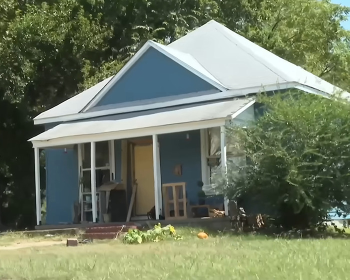 Small blue house in a grassy yard, related to grandma arrested after 11YO girl allegedly gave birth case. Small blue house in a grassy yard, related to grandma arrested after 11YO girl allegedly gave birth case.