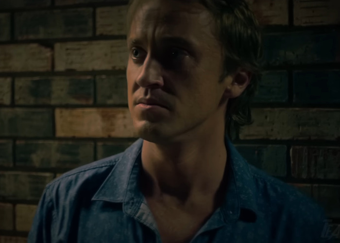 Young man in a dimly lit setting, representing Harry Potter and the Cursed Child fan-made trailer scene. Young man in a dimly lit setting, representing Harry Potter and the Cursed Child fan-made trailer scene.