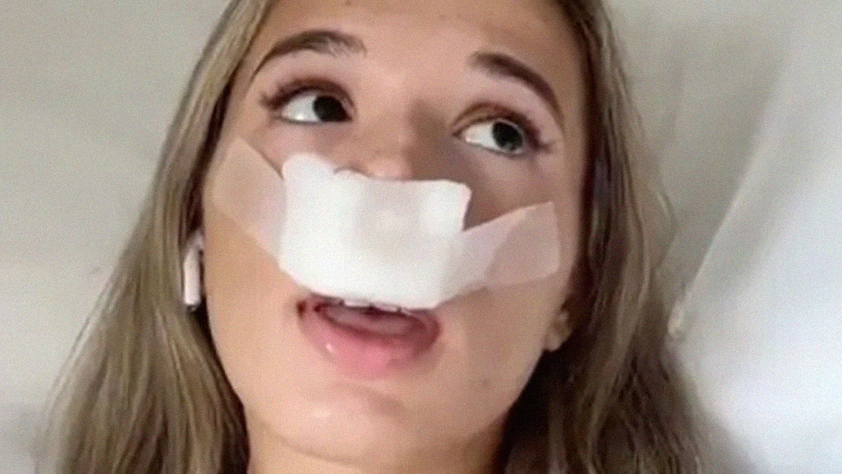 Young woman with nose bandage wearing wireless earphones in a casual setting, part of smart TikTok screenshots collection.
