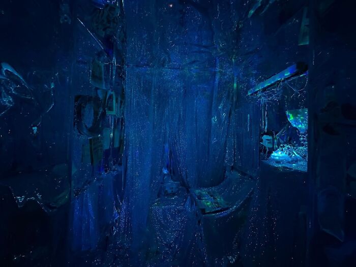 NYC apartment transformed into a detailed Titanic movie set with blue lighting and ship-themed decorations by New York model. NYC apartment transformed into a detailed Titanic movie set with blue lighting and ship-themed decorations by New York model.