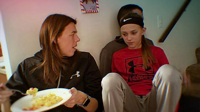 Mother and daughter sit indoors wearing sportswear, as prosecutor explains alleged secret torment over a year. Mother and daughter sit indoors wearing sportswear, as prosecutor explains alleged secret torment over a year.