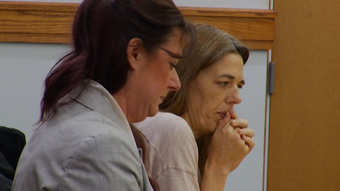 Two women in a courtroom setting, one appearing concerned as prosecutor explains mom secretly tormented daughter over a year. Two women in a courtroom setting, one appearing concerned as prosecutor explains mom secretly tormented daughter over a year.