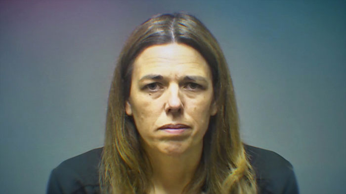 Mugshot of a woman accused of secretly tormenting her daughter, highlighting prosecutor’s case details. Mugshot of a woman accused of secretly tormenting her daughter, highlighting prosecutor’s case details.