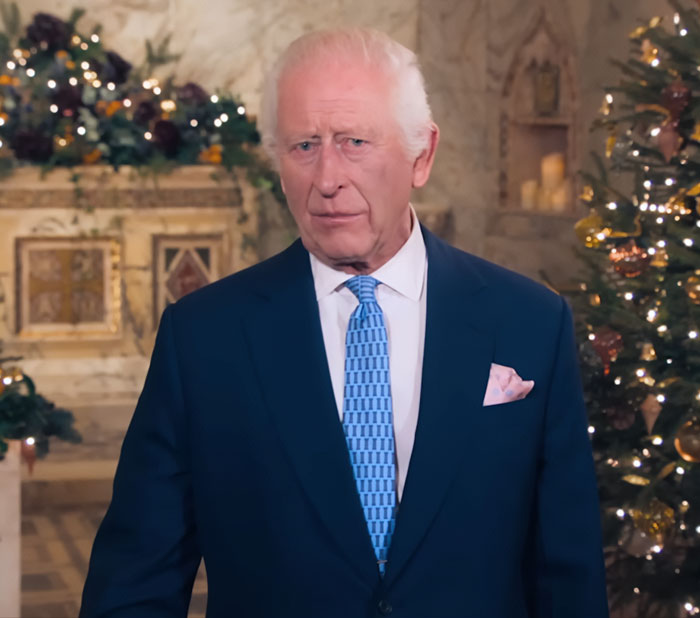 King Charles in a formal suit, delivering an emotional update on his incurable cancer in a decorated interior setting. King Charles in a formal suit, delivering an emotional update on his incurable cancer in a decorated interior setting.