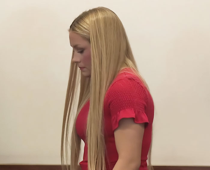 Young woman with long blonde hair wearing a red dress, related to autopsy findings of newborn found in cheerleader's closet. Young woman with long blonde hair wearing a red dress, related to autopsy findings of newborn found in cheerleader's closet.