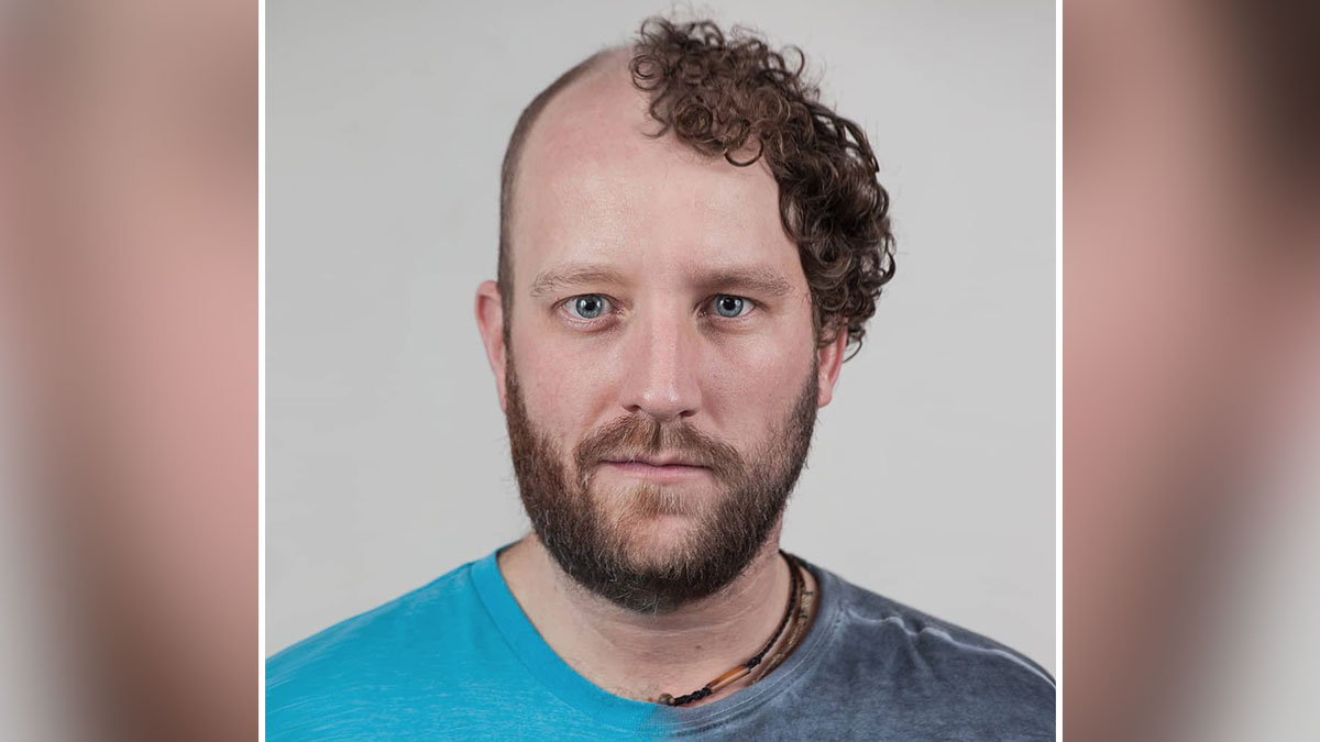 Portrait of a man with curly hair on one side showing strong family DNA traits in a genetic portrait.