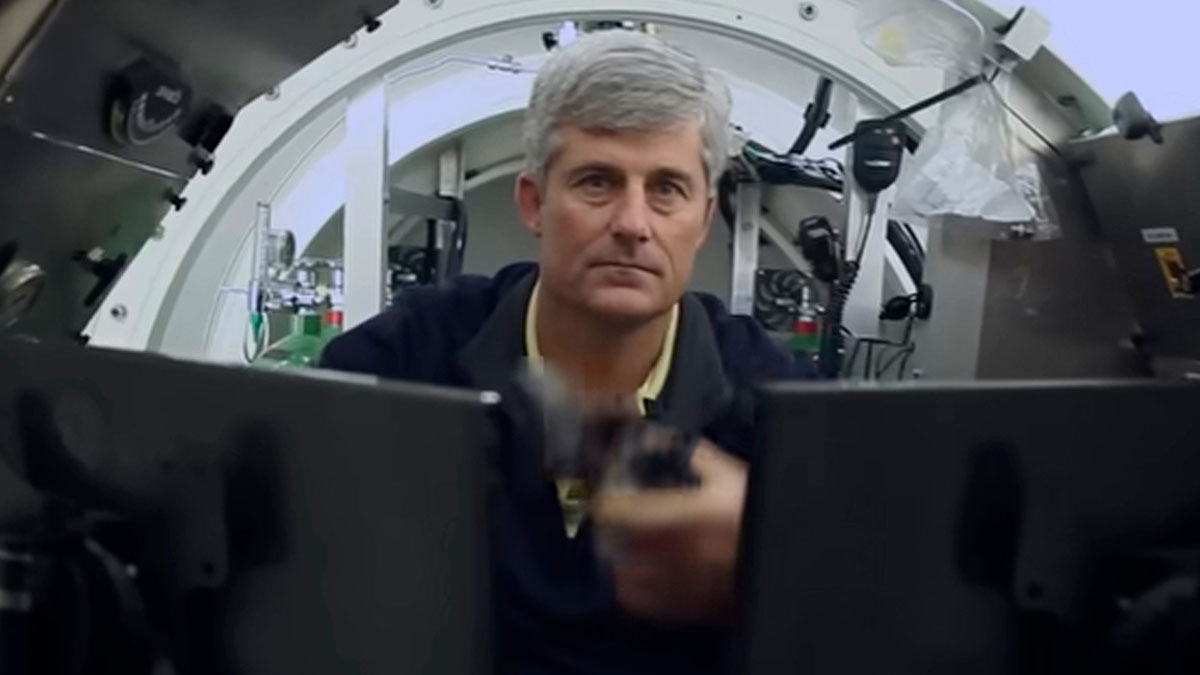 Man inside a high-tech control room, focused on screens, illustrating people who completely ruined their lives fast.