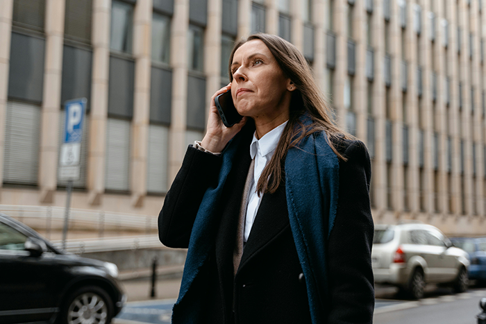 Woman in black coat talking on phone outdoors, reflecting shallow man’s reaction to wife’s new weight and lies exposed Woman in black coat talking on phone outdoors, reflecting shallow man’s reaction to wife’s new weight and lies exposed