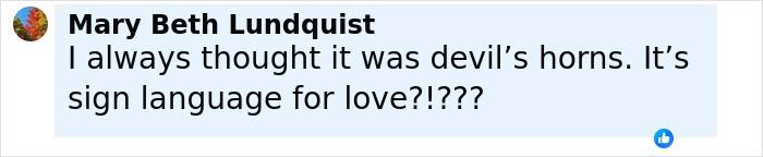 Comment by Mary Beth Lundquist discussing devil’s horns gesture interpreted as sign language for love related to Erika Kirk's funeral. Comment by Mary Beth Lundquist discussing devil’s horns gesture interpreted as sign language for love related to Erika Kirk's funeral.