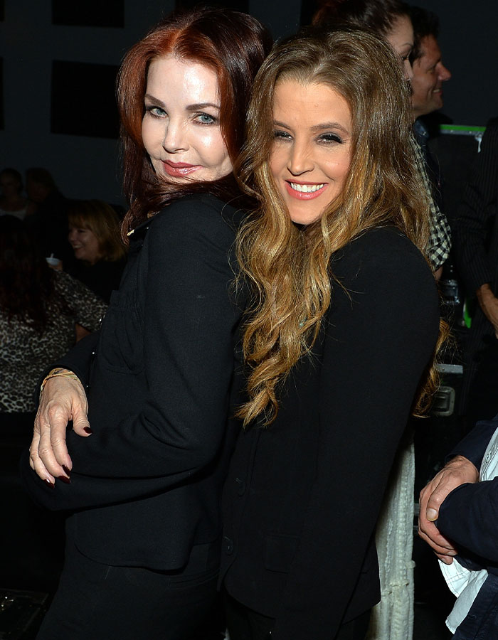 Priscilla Presley and Lisa Marie Presley posing together at an event, relating to lawsuit and final moments. Priscilla Presley and Lisa Marie Presley posing together at an event, relating to lawsuit and final moments.