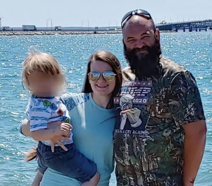 Family of three standing by the water, related to Michigan church tragedy, conspiracy theorists, and Charlie Kirk attack discussions. Family of three standing by the water, related to Michigan church tragedy, conspiracy theorists, and Charlie Kirk attack discussions.