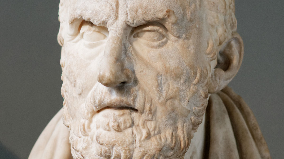 Close-up of an ancient marble bust showing detailed facial features, illustrating real life more interesting and bizarre than fiction.