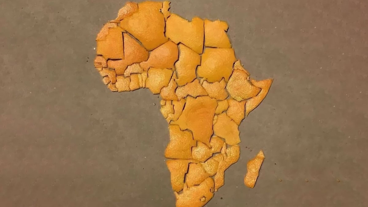 Map of Africa made from orange peel pieces arranged on a brown surface as a funny bad map example