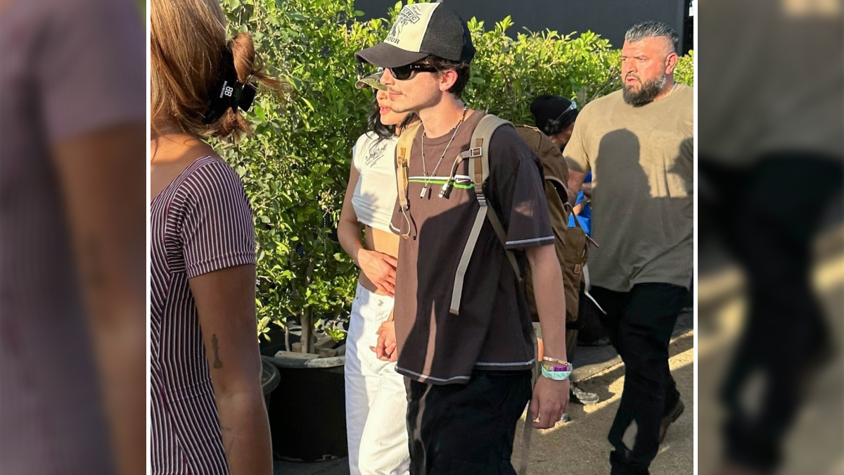 Timothu00e9e Chalamet walking outdoors in casual clothes and sunglasses, with people around, updated on relationships and girlfriends.