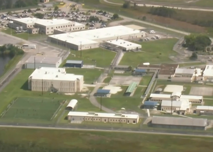 Aerial view of detention center with hundreds of detainees reportedly missing from ICE records after transfer. Aerial view of detention center with hundreds of detainees reportedly missing from ICE records after transfer.