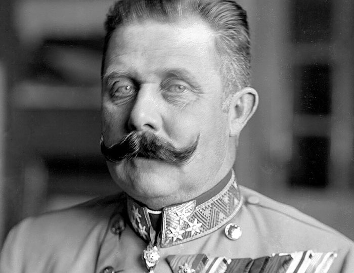 Black and white portrait of a historical military figure with a large mustache, representing bizarre and fascinating historical events.