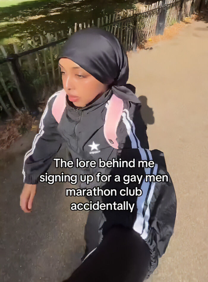 Woman walking outdoors in athletic wear, sharing her accidental signup for a gay running club in viral footage. Woman walking outdoors in athletic wear, sharing her accidental signup for a gay running club in viral footage.