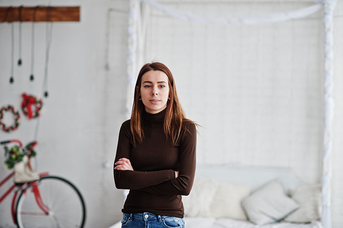 Woman rejecting sister’s money hints, sibling angry over Ibiza pics while family struggles financially indoors.