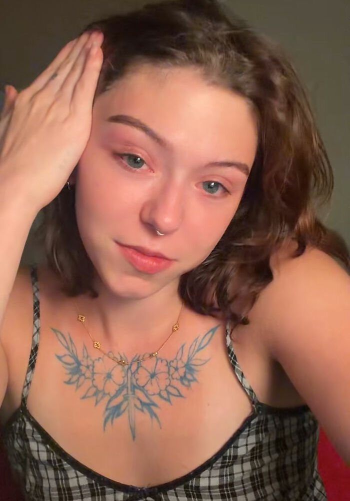 Young woman with a removed nose ring posing, going viral after men say she looks like a Democrat without it. Young woman with a removed nose ring posing, going viral after men say she looks like a Democrat without it.