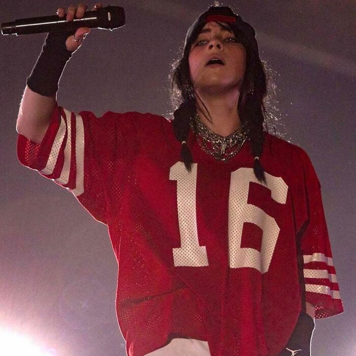 Billie Eilish performing at Miami concert while fans react to man trying to snatch her on stage. Billie Eilish performing at Miami concert while fans react to man trying to snatch her on stage.