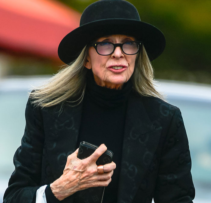 Diane Keaton wearing black hat and glasses outdoors, related to last moments revealed in 911 call and tributes. Diane Keaton wearing black hat and glasses outdoors, related to last moments revealed in 911 call and tributes.