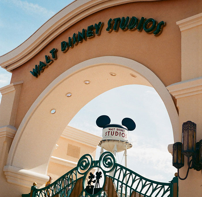 Entrance arch of Walt Disney Studios with Mickey Mouse ears water tower, related to Disney film backlash and propaganda keyword. Entrance arch of Walt Disney Studios with Mickey Mouse ears water tower, related to Disney film backlash and propaganda keyword.